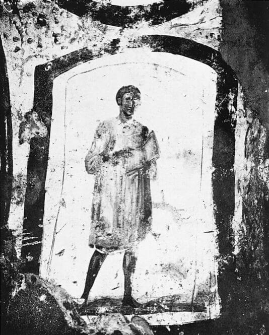 手持打开的《圣经》抄本的青年男子画像，发现于3世纪的罗马地下墓窟中